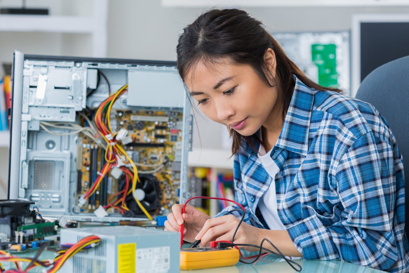 student girl in technology fixug computer hard drive